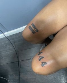 the legs of a woman with tattoos on them