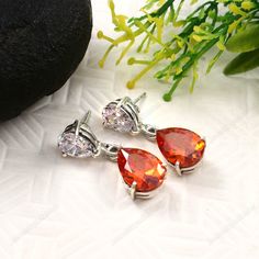 Orange white Topaz gemstone earring/Dangle  Teardrop Large bi-color imperial Orange white Topaz dangling earrings, orange Red topaz drop earrings, gift for her,925 sterling silver,Wow,November April birthstone Gemstone- Orange Topaz-10x14mm  About gemstone- Orange Topaz Orange Topaz is a great stone for stabilizing, strengthening, and healing your emotional body. What is this? Its energy will show you the real meaning of truth, honesty, and forgiveness. It will replace your negativity, fear, and White Pear-shaped Crystal Earrings Gift, Pear-shaped Orange Jewelry Gift, Orange Pear-shaped Jewelry For Gifts, Orange Cubic Zirconia Jewelry For Gift, Orange Cubic Zirconia Jewelry Gift, Orange Cubic Zirconia Jewelry As A Gift, Orange Drop Earrings For Anniversary, Gift White Gold Teardrop Crystal Earrings, White Gold Teardrop Crystal Earrings For Gift