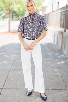 We can't let you go before you take a look at this blouse! This ditsy floral blouse is just so cute and feminine! It's also versatile! You can wear it to dinner or work, summer or fall! The options are endless! Mock neckline Tied keyhole back Short bubble sleeves Ditsy floral print No stretch Baileigh is wearing the small Feminine Ditsy Floral Print Blouse For Day Out, Feminine Blouse With Ditsy Floral Print For Day Out, Short Sleeve Blouse With Ditsy Floral Print For Spring, Casual Short Sleeve Blouse For Garden Party, Chic Floral Print Cotton Blouse, Feminine Floral Print Blouse For Work, Feminine Floral Print Workwear Blouse, Chic Cotton Blouse With Floral Print, Chic Floral Print Blouse For Garden Party