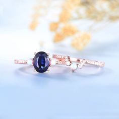 Sapphire Engagement Ring, Oval Blue Sapphire Wedding Ring Set, September Birthstone, Opal Stacking Ring, Gemstone Ring, Anniversary Gift Unique wedding set,perfect as engagement/wedding ring, birthday or anniversary gift, etc. If you need one more wedding band, please see the below link: www.etsy.com/listing/851040980/opal-stacking-band-dainty-opal-ring-opal?ref=shop_home_active_1 Opal ring set: www.etsy.com/listing/685847028/opal-ringwhite-fire-opal-engagement-ring?ref=shop_home_feat_2&bes= Oval Sapphire Birthstone Ring For Wedding, Oval Sapphire Wedding Birthstone Ring, Oval Blue Birthstone Ring For Wedding, Blue Oval Birthstone Ring For Wedding, Fine Jewelry Blue Opal Wedding Ring, Blue Sapphire Wedding Ring Set, Sapphire Engagement Ring Oval, Sapphire Wedding Ring Set, Unique Wedding Sets