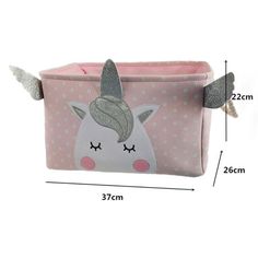 a pink unicorn storage bag with silver glitters on the ears and tail, sitting next to a white background