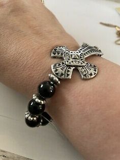 Black bead stretch bracelet hammered cross Silvertone NEW! p553 | eBay Casual Cross Jewelry For Gifts, Casual Cross Jewelry Gift, Adjustable Cross Stretch Bracelet As Gift, Adjustable Beaded Cross Rosary Bracelet, Adjustable Cross Stretch Bracelet Spiritual Style, Adjustable Black Cross Jewelry, Black Cross Bracelet As Gift, Black Cross Jewelry With 8mm Beads, Metal Cross Bracelets