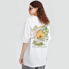 This vibrant tee features an oil painting of the beloved Little Prince, capturing his whimsical spirit. Show off your love for this timeless story and add a touch of artistry to your wardrobe. Perfect for fans of all ages. (Wearable art for all ages!) Features: -100% Cotton -Crew Neckline -Dropped Shoulder -Regular fit -Unisex style Cotton Crew Neck T-shirt With Artwork, White T-shirt With Artwork For Summer, Cotton Artwork T-shirt With Short Sleeves, Cotton Artwork T-shirt With Crew Neck, Cotton Graphic Tee With Artwork, Crew Neck Cotton T-shirt With Artwork, Graphic Cotton Tee With Artwork, Cotton Crew Neck Top With Artwork, Graphic Tee Cotton T-shirt With Artwork