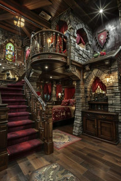 this is an image of a fancy house with red carpeted stairs and stone walls