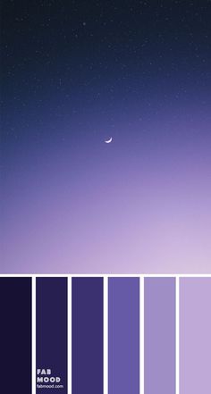 the sky is filled with purple and blue hues, as well as some stars