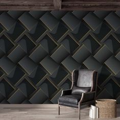 a chair sitting in front of a black wall with gold geometric design on the walls