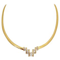 Designed by Nova, this 18 karat yellow gold choker necklace is a real showstopper. The centerpiece is the 0.85 carat oval diamond. Four rows of invisibly set round brilliant cut diamonds flank the center stone. The central motif is set into a 16" flat omega chain. Stamped 750 Italy Total diamond weight 1.73 carats Luxury 22k Gold Diamond Cut Jewelry, Luxury Yellow Gold Diamond Necklace With Diamond Eyes, Luxury Yellow Gold Diamond Necklace With 17 Jewels, Luxury 22k Gold Necklaces, Diamond Collar, India Jewelry, Gold Choker Necklace, Gold Choker, Oval Diamond