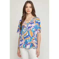 This Top Features Short Sleeves, A V-Neckline, A Colorful Abstract Print, Is Light Weight, Has Soft & Stretchy Fabric And Has A Relaxed Oversized Silhouette. * Small Bust 44" Length 25" : Medium Bust 46" L 25" * Large Bust 48" L 25" : Xl Bust 54" Length 28" * 1x Bust 56" Length 28" : 2x Bust 58" Length 28" * 96% Polyester 4% Spandex * Hand Wash Or Dry Clean * Made In The Usa 6920 Chic Blue V-neck Top For Spring, Chic Blue V-neck Top For Summer, Blue V-neck Top For Vacation, Blue V-neck Blouse For Day Out, Blue V-neck Blouse For Vacation, Blue V-neck Top For Beach, Blue V-neck Tops For The Beach, Blue V-neck Beach Tops, Chic Blue V-neck Blouse