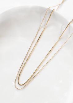 Highlights • Made With 14k Gold Filled Pieces • 1mm Width • Available In 14”, 16”, 18”, 20”, 22” Lengths About This Piece Our simple and minimal necklaces are made to suit anyone and will last a lifetime! Layer these chains with any necklace for a trendy, custom look. Minimal Necklace, Silver Pieces, Box Chain, Ball Chain, Gold Filled, Silver Jewelry, Highlights, Gold Necklace, Yellow Gold