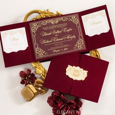 the wedding stationery is maroon and gold