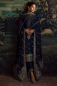 • Embroidered and sequined silk front• Embroidered and sequined silk sleeves• Plain dyed silk back• Embroidered and sequined silk border for sleeves• Embroidered and sequined silk motif for back• Embroidered and sequined silk motifs for sleeves• Embroidered and sequined silk border for front chaak• Embroidered and sequined silk border for back chaak• Embroidered and sequined silk neckline for front• Embroidered and sequined silk border for front• Embroidered and sequined silk border for back• Di Elegant Dabka Embroidered Fabric For Festive Occasions, Festive Lawn Suit In Dola Silk With Dabka Detail, Festive Lawn Suit In Dola Silk With Dabka, Designer Lawn Suit With Mirror Work For Eid, Festive Lawn Suit With Dabka In Dola Silk, Eid Lawn Suit With Mirror Work In Chinon, Eid Designer Lawn Suit With Mirror Work, Eid Raw Silk Lawn Suit With Mirror Work, Eid Lawn Suit In Raw Silk With Mirror Work