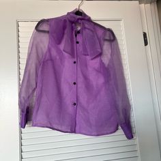 Purple Sheer Neck Bow Blouse. Lined In The Front, Sheer In The Back. Never Worn. Purple Sheer Tops For Party, Sheer Purple Party Top, Purple Blouse For Spring Formal Occasion, Spring Season Formal Purple Top, Purple Formal Top For Spring, Formal Purple Top For Spring, Formal Purple Summer Blouse, Neck Bow, Bow Blouse