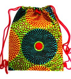 Practical little backpack made from beautiful Ghanian waxprint. The backpack is made from 100% cotton and can be washed, the colors will stay the same. Measures about 42cm x 36cm. Green Cotton Standard Backpack, Green Cotton Backpack For Daily Use, Daily Use Green Cotton Backpack, Eco-friendly Multicolor School Backpack, Multicolor Cotton Backpack For Daily Use, Handmade Multicolor Casual Backpack, Casual Handmade Multicolor Backpack, Casual Multicolor Handmade Backpack, Handmade Backpack