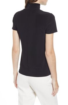 Strike a sleek and slimming silhouette in this mock-neck top with short sleeves for easy wear in any season. Mock neck Short sleeves 94% polyester, 6% elastane Machine wash, line dry Imported Point of View Mock Neck Top, Point Of View, Anne Klein, Easy Wear, Mock Neck, Short Sleeves, Nordstrom, Sleek, How To Wear