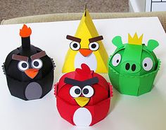 three angry birds made out of paper sitting on top of a table