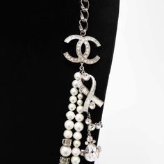 For Sale on 1stDibs - Wonderful couture CHANEL necklace crystals and pearls Condition: very good Materials: pearls, metal, crystal, cultured pearl Color: white, silver Dimensions: Luxury Silver Pearl Embellished Necklace, Luxury Metal Pearl Chain Necklace, Luxury Pearl Necklace With Metal Chain, Luxury Silver Pearl Chain Necklace, White Long Necklace For Evening, Silver Pearl Necklace With Chain, White Crystal Rhinestone Necklace, Luxury Silver Pearl Necklace For Party, Long Silver Pearl Necklace For Party