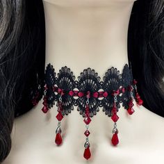 Dear customers, for a price offer of expedited shipping outside of Germany, please contact me directly via Etsy messages. One of a kind gothic lace beaded choker and earrings, made with black lace a dark red satin ribbon, with hand sewn deep red Swarovski beads and teardrops, the perfect decoration for a gothic queens neck. Goth fashion is distinguished by darkness, mystery, elegant wardrobe pieces and, smoky makeup even though it may surprise some that not all Goths always wear black. It's said Emo Halloween Party Necklaces, Emo Halloween Festival Necklace, Red Gothic Jewelry For Party, Handmade Punk Choker For Gift, Red Punk Choker As Gift, Handmade Vampire Style Party Necklace, Black Vampire Choker For Halloween, Handmade Halloween Choker Jewelry, Handmade Punk Black Choker