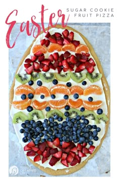 a fruit pizza with cream cheese and fresh fruits on top is ready to be eaten