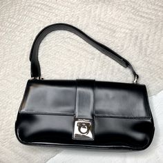 100% Authentic Guaranteed Black Ferragamo W/ Adjustable Strap Very Good Condition **Available Cheaper On Ig @Yes2luxury** Classic Baguette Shoulder Bag For Shopping, Classic Baguette Bag With Hasp Closure, Timeless Shoulder Bag With Hasp Closure, Classic Clutch Baguette Bag, Classic Square Baguette Bag For Shopping, Elegant Baguette Tote Bag With Hasp Closure, Elegant Tote Baguette Bag With Hasp Closure, Timeless Black Shoulder Bag For Shopping, Classic Satchel Baguette Bag For Shopping