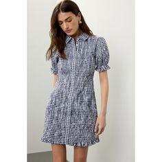 Navy Gingham (100% cotton). Casual Dress. Collared neck. Short sleeve. Front button closure. 35" from shoulder to hemline. Imported. Spring Preppy Short Sleeve Plaid Dress, Preppy Short Sleeve Plaid Dress For Spring, Short Sleeve Gingham Dress For Daywear, Gingham Short Sleeve Dress For Daywear, Cotton Mini Shirt Dress With Ruffles, Plaid Shirt Dress For Work In Summer, Short Sleeve Cotton Plaid Spring Dress, Short Sleeve Cotton Plaid Dress For Spring, Spring Cotton Plaid Dress With Short Sleeves