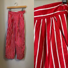 Vintage Courrèges striped cotton trousers. high waist. pleat front. slant hip pockets. cuffed hem. side zip closure. two buttons at waist. ✩ These trousers are an amazing find, rare by notable French designer Andre Courrèges! Circa 1970s Courrèges Made in France Cotton Red/White Excellent Condition. No notable flaws. ✂----M e a s u r e m e n t s: all in inches. Waist: 23/24 Hips: up to 36 Inseam: 24 Rise: 13 Length: 37 All measurements are taken flat. ❉ this is a vintage item and there is ONLY o Summer Wide-leg Pants With Contrast Stripes, Chic Striped Wide Leg Cotton Pants, Chic Striped Cotton Wide Leg Pants, Summer Wide Leg Pants With Contrast Stripes, Pinstripe High-waisted Pants For Summer, Summer Pinstripe High-waisted Pants, Relaxed Fit Striped Wide Leg Pants For Spring, Pinstripe Wide Leg Cotton Bottoms, Pinstripe Wide Leg Summer Bottoms