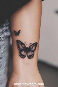 a small butterfly tattoo on the ankle