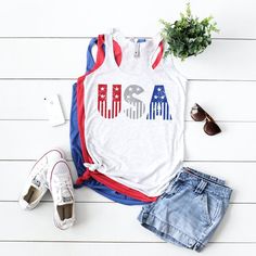 Check out this item in my Etsy shop https://www.etsy.com/listing/704558615/usa-tank-top-women-july-4th-tank-4th-of Casual 4th Of July Tank Top With Letter Print, Casual American Flag Print Tank Top, Casual 4th Of July Graphic Tank Top, Casual 4th Of July Graphic Print Tank Top, Casual Graphic Print Tank Top For 4th Of July, Sleeveless Graphic Print Top For 4th Of July, 4th Of July White Tank Top With Flag Print, Sleeveless Cotton Top With Flag Print, Red Sleeveless Tank Top With Flag Print