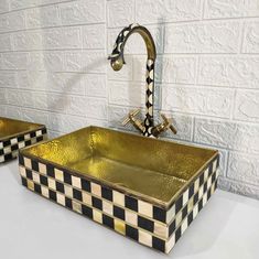 two black and white checkered sink with faucet