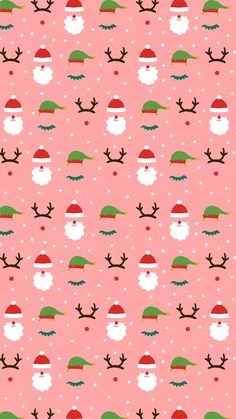 a pink background with santa claus and reindeer hats