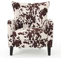 a brown and white chair with black legs