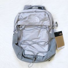 New With Tags- The North Face Women’s Borealis Mini 10 Liter Backpack In Tnf White Metallic Melange / Mid Grey. Dimensions: 8.65” X 4.15” X 13.5”. North Face Backpack School, Mint Backpack, Backpack Inspiration, Nort Face, School Backpack Essentials, Gray Backpack