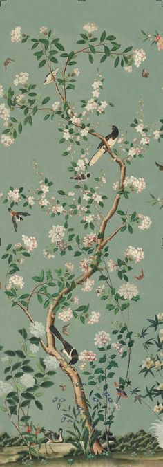 birds sitting on the branches of a flowering tree