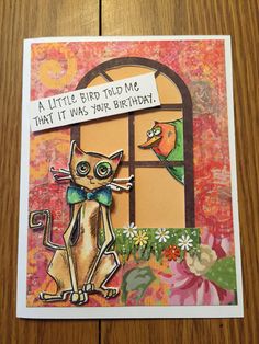 a card with an image of a cat and a bird on the window sill that says, a little bird told me that it was your birthday