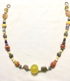 Unique necklace made with semiprecious stones, lamp work and other glass, and metal beads. Viking/medieval style, but can be worn for any occasion. Bead types researched for historical accuracy; two bead types not historically accurate. Can add toggle, hook, or lobster clasp and chain. Gift bag included. Bead Types, Viking Medieval, Medieval Style, Medieval Fashion, Unique Necklace, Unique Necklaces, Metal Beads, Beaded Pendant, Chain Styles