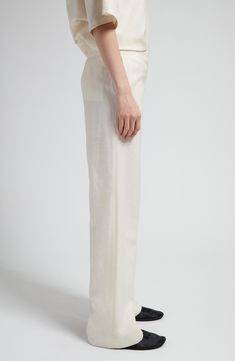 Foulard fabric in a blend of wool, silk and linen brings tactile dimension to these full-length pants cut in a relaxed silhouette with pressed creases. 33" inseam; 25" leg opening; 11" front rise; 16" back rise (size 14) Side-seam pockets; back welt pocket 49% wool, 26% silk, 25% linen Dry clean Made in Italy Designer Clothing Tailored Silk Tapered Leg Bottoms, Classic Silk Dress Pants With Straight Leg, Tailored Silk Bottoms With Tapered Leg, Classic Silk Straight Leg Dress Pants, Elegant Linen Wide-leg Dress Pants, Tailored Linen Wide-leg Bottoms, Tailored Silk Straight Leg Bottoms, Tailored Linen Wide Leg Bottoms, Tailored Straight Leg Silk Bottoms