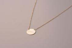 "Disc Necklace * The most special jewelry in Etsy, unique gift for you and your beloved ones. Disc necklaces are designed to show your passion and love to your loved ones with special memories. C U S T O M * D I S C * N E C K L A C E * Material: High quality 925 Sterling Silver plated in 14K Gold or 14K Solid Gold * Dimension: 14mm diameter * Finish: Gold, Rose Gold, White Gold F E A T U R E S * Made to Order * High Quality Material * Personalized * Packaged with Elegant Jewelry Box * Handmade a Customized Classic Round Jewelry, Classic Customized Round Jewelry, 14k Gold Round Pendant Name Necklace, Customized Pendant Jewelry For Everyday Wear, Customized Round Jewelry For Everyday, Customized Everyday Pendant Jewelry, Everyday Customized Pendant Jewelry, Customized Jewelry For Everyday Wear, Gift 14k Gold Round Disc Charm Necklace