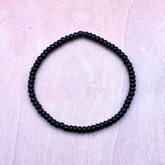 Black Bead Bracelet ** Black Beaded Bracelet ** Thin Black Bracelet ⚠️NOTE: Please do not guess wrist size! Always measure your wrist :) 📌 DETAILS: * 4mm Black Seed Beads * Elastic Stretch Cord  IMPORTANT -- PLEASE READ  ⭐️ NOTE: Ullabeads jewelry pictures are enlarged to show detail. These seed beads are SMALL (approximately 3.5- 4mm) and are not always uniform in shape.  * Please check out the 6mm/8mm bead sections if you prefer bigger/ chunkier beads. {Check Bead Size Reference Picture} ** P Black Bracelet For Men, Black Friendship Bracelet, Black Friendship, Black Bead Bracelet, Black Beaded Bracelet, Jewelry Pictures, Bead Anklet, Black Beaded Bracelets, Bracelet Minimalist