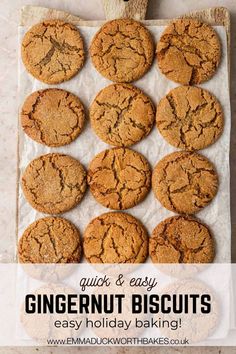 twelve cookies on a baking sheet ready to be baked in the oven, with a wooden spatula