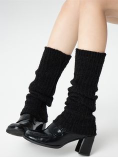 Embrace the chill of autumn and winter with these delightful leg warmers, available in classic shades of white, black, and gray. Crafted from a soft, cozy knit, these leg warmers are designed to keep you warm and stylish all season long. Black Knee-high Winter Socks, Trendy Black Knee-high Socks For Winter, Black One Size Socks For Fall, One Size Black Socks For Fall, Classic Gray Socks For Winter, Black Knitted Stretch Knee-high Socks, Black Knee-high Socks For Fall, Black Knee-high Socks One Size, Black Stretch Knitted Knee-high Socks