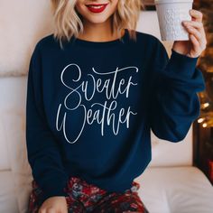 "Embrace the cozy allure of the season with our enchanting \"Sweater Weather\" Sweatshirt, hand-lettered with love and care to capture the whimsy and simplicity of this cherished time of year. 🍂 **Sizes for Every Silhouette From S to 3XL, our \"Sweater Weather\" Sweatshirt is designed to cater to all body types, ensuring a comfortable and stylish fit for every individual. Find your perfect size by referring to our detailed size chart in the photos, guaranteeing a snug and flattering silhouette. Holiday Sweatshirt, Shirt Sweater, Sweatshirt Christmas, Holiday Sweater, Winter Holiday, Hand Lettered, Sweater Weather, Winter Holidays, Christmas Sweater