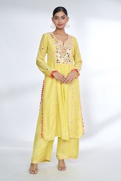 Yellow front gathered kurta with mirror embroidered yoke and sleeves with potli borders. Comes with coordinating palazzo. - Aza Fashions Bohemian Kurta With Gota Work And Long Sleeves, Bohemian Long Sleeve Kurta With Gota Work, Festival Long Sleeve Palazzo Set With Dori Work, Bohemian Anarkali Set With Dori Work, Bohemian Salwar Kameez With Dori Work, Bohemian Kurta With Dori Work For Navratri, Bohemian Dori Work Kurta For Navratri, Gopi Vaid, Yellow Mirror