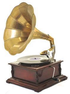 an old fashioned record player with a golden horn on it's wooden stand, isolated against a white background