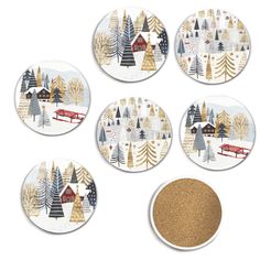 six coasters with christmas trees and houses on them, all decorated in gold glitter