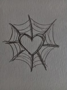 a drawing of a spider's web with a heart on the center and two hearts in the middle