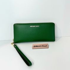 Brand New With Tags 100% Authentic Jet Set Travel Lg. Continental Wallet/Wristlet Color: Fern Green Gold Tone Hardware 8.25”W X 4"H X 1"D Shipping Same/Next Day Smoke/Pet Free Home. Michael Kors Elegant Clutch Wallet, Elegant Michael Kors Clutch Wallet, Everyday Michael Kors Rectangular Clutch, Michael Kors Clutch Wallet For Daily Use, Michael Kors Rectangular Everyday Clutch, Elegant Michael Kors Wallets For Daily Use, Elegant Green Pouch Wallet, Michael Kors Wallet With Zipper Closure For Everyday, Classic Michael Kors Wallet For Everyday Use