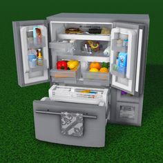 an open refrigerator with its door wide open on the grass, showing food and drinks inside