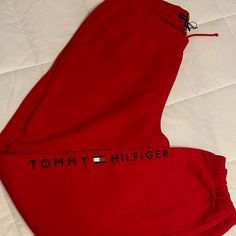 Tommy Hilfiger Xs Red Sweatpants. Unisex. Brand New. Never Used. 100% Cotton. Stylish. Very Soft And Easy To Wear. No Smells, No Damages And No Stains. View Photos For Measurements. Thank You For Viewing My Closet Red Athleisure Sweatpants For Loungewear, Red Sporty Pants For Loungewear, Red Athleisure Bottoms For Loungewear, Red Athleisure Loungewear Bottoms, Red Sporty Sweatpants For Spring, Sporty Red Sweatpants For Spring, Trendy Red Loungewear Bottoms, Trendy Cotton Tommy Hilfiger Bottoms, Trendy Tommy Hilfiger Cotton Bottoms