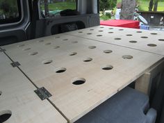 the table is made out of plywood and has holes in it