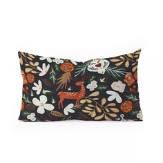 a decorative pillow with an animal and flowers pattern on the front, along with a black background