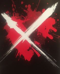 a red and white cross painted on the side of a black wall with paint splatters